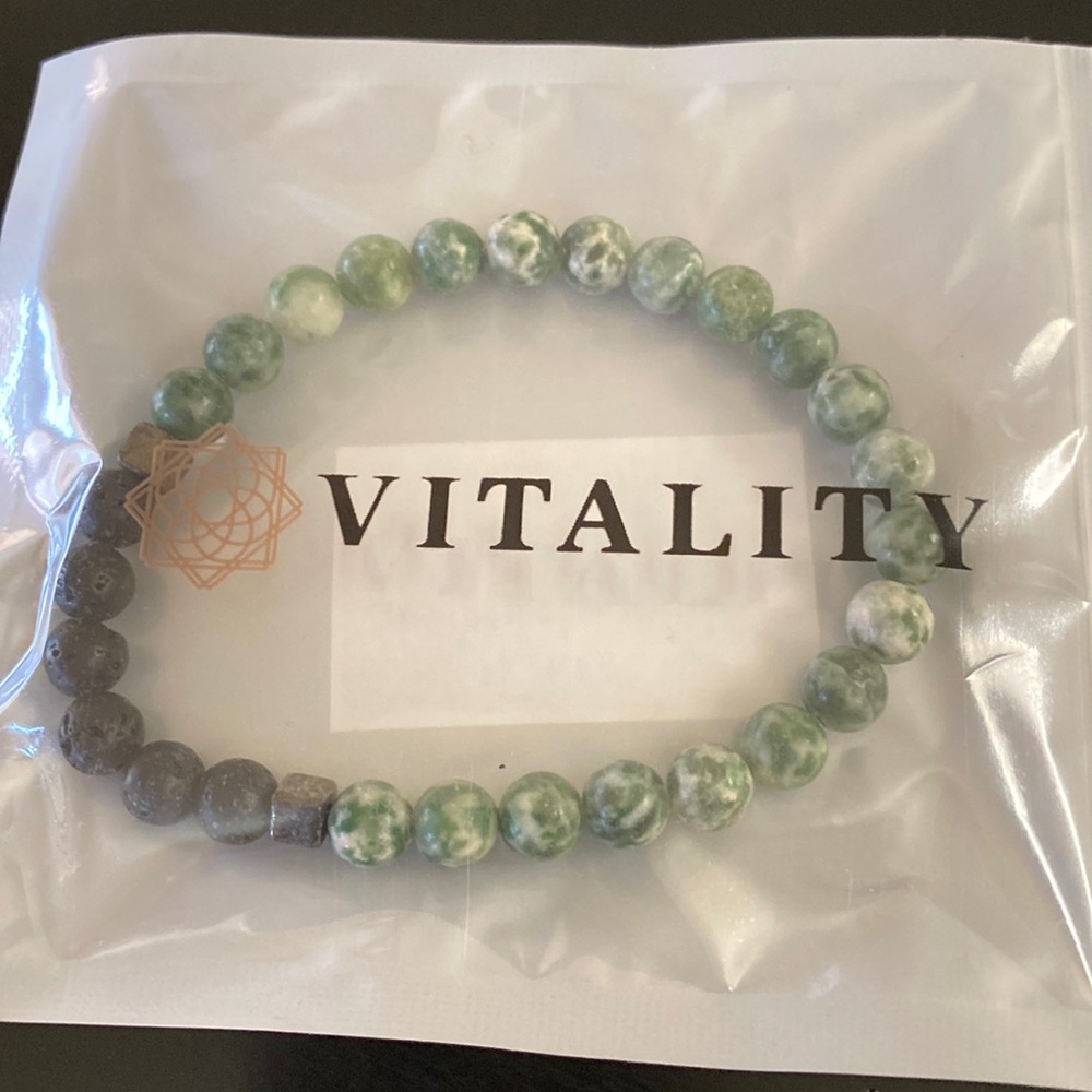 Inner Peace diffuser bracelet , green jasper beads and lava stones.